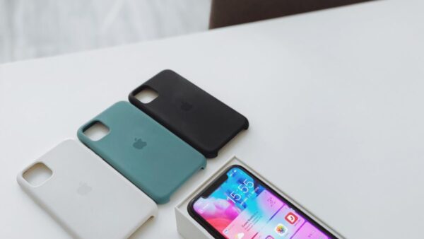 silver iphone 6 on white table