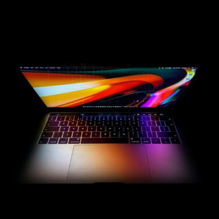 macbook pro turned on displaying red blue and yellow lights