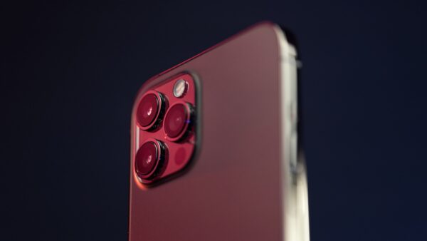 red and black device on white surface