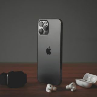 black iphone 7 with white and black dice