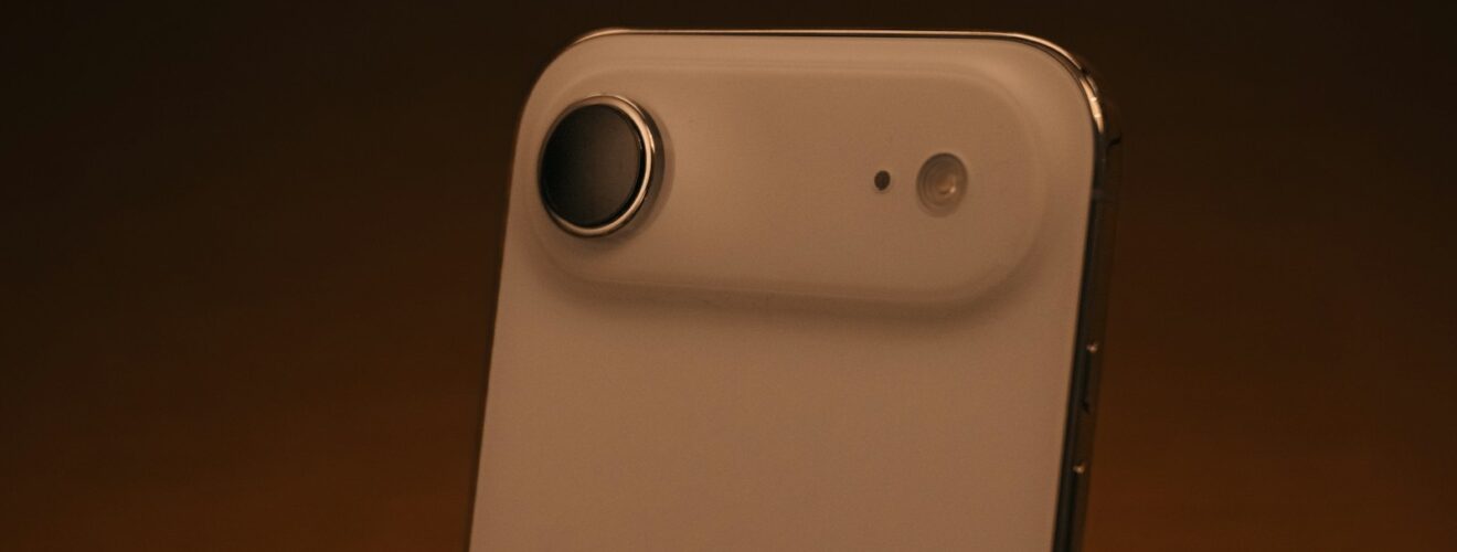 Close-up of a white smartphone camera lens