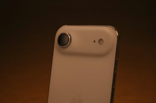 Close-up of a white smartphone camera lens