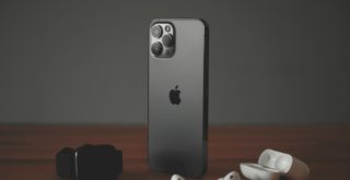 black iphone 7 with white and black dice